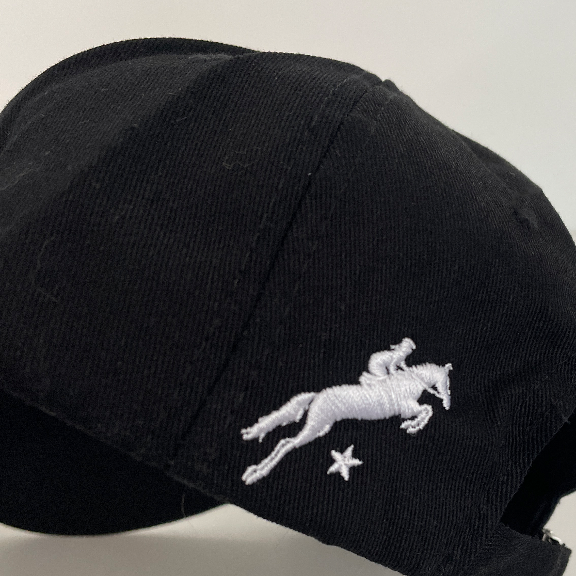 logo detail pferd kappe sunshine schwarz springstar