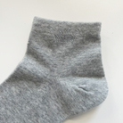 Kurze Damen Socken mit Glitzer Krone grau

