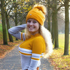 bommel muetze-marnie-curry-fellbommel-fellbommelmuetze-strickmuetze-curry-muetze-kunstfell-plueschmuetze-wintermuetze-gelb-springstar-spooks-loesdau-asos.